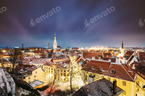 Preview: Tallinn, Estonia. Night Starry Sky Above Traditional Old Architecture Cityscape Skyline In Old Town
