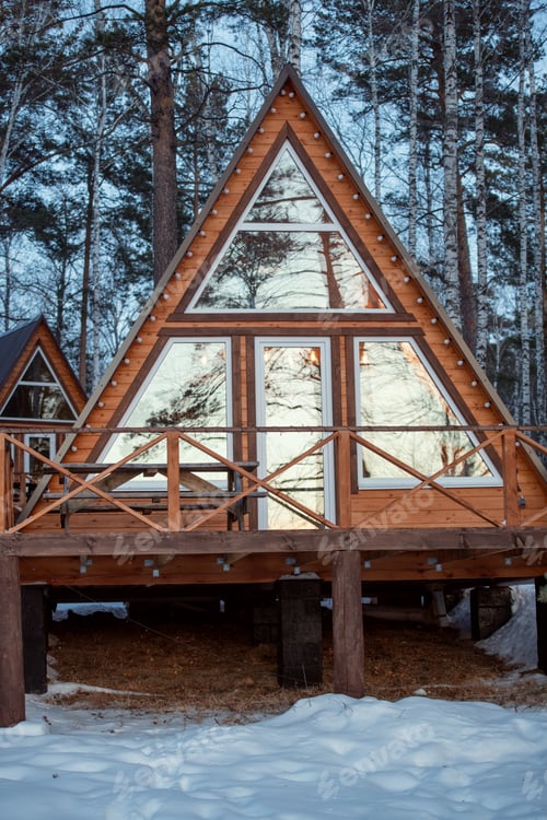 Preview: Large country house standing in snow in front of camera against other residence