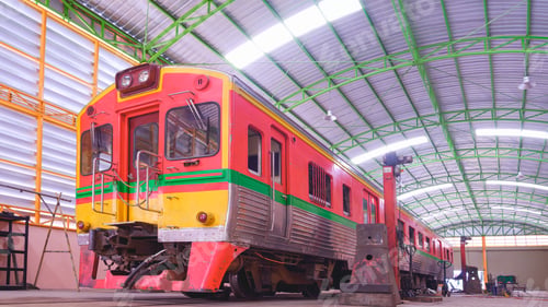 Preview: An old diesel train in garage awaiting to maintenance and improvement wheels and suspension system