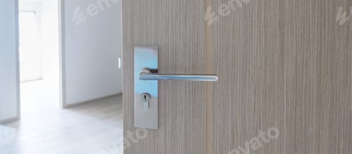 Preview: Closeup doorknob of wooden door between open or close the door