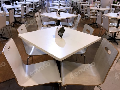 Preview: Tables and Chairs Line Up in a Cafeteria