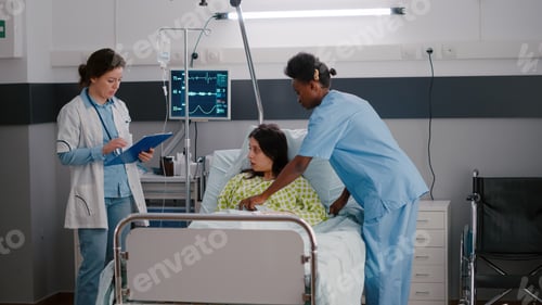 Preview: Medical practitioner doctor checking sick woman monitoring disease symptom