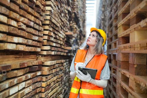 Preview: Industrial factory employee working in wooden manufacturing industry