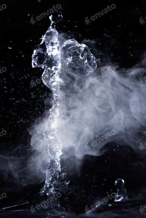 Preview: Boiling water splash with steam on black background closeup