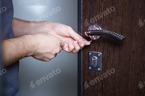 Preview: Locksmith replacing door lock to new after losing keys