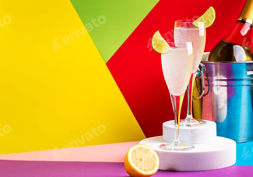 Preview: French 75 cocktail with dry gin, prosecco wine, syrup, lime and lemon juice