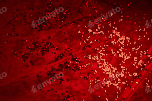 Preview: Abstract Christmas background made of red velvet fabric with red sparkles.