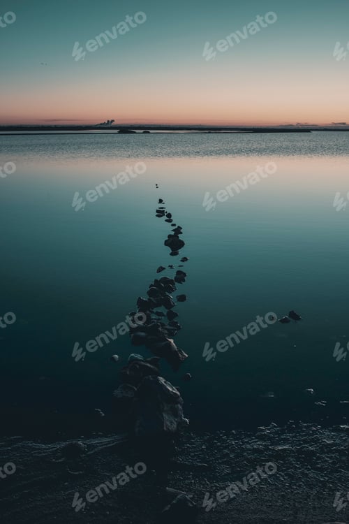 Preview: Misty landscape at calm lake in morning sunrise. Concept of beautiful water scenic place