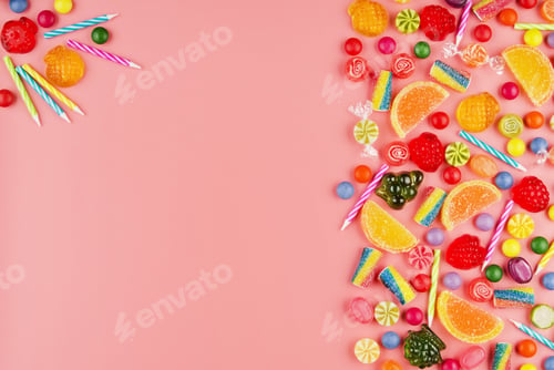 Preview: Flat lay view at sweet background of different type color and taste candies
