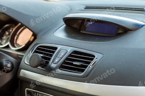 Preview: Modern expensive car interior. Dashboard in black color.