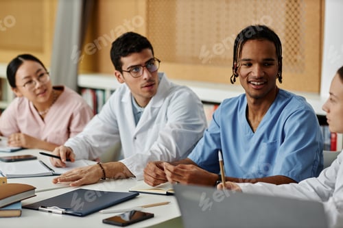 Preview: Diverse group of young medical professionals at seminar