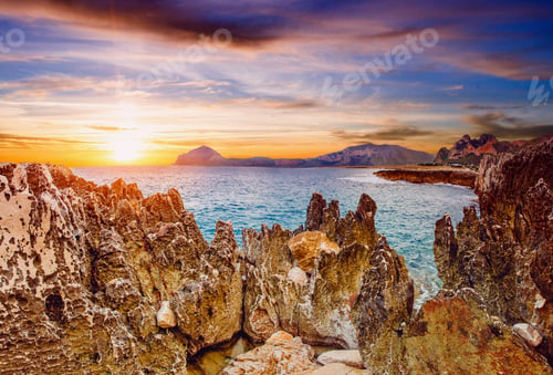 Preview: Sunset over the rocks.