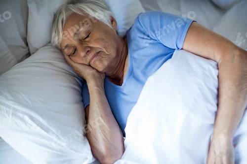 Preview: Senior woman sleeping in the bedroom
