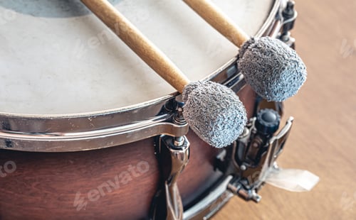 Preview: Close-up, drumsticks on a blurred background.