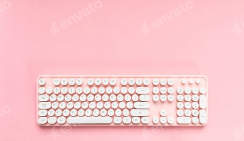 Preview: Computer keyboard isolated against pink background