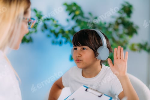 Preview: Hearing Test for Children. Audiologist Working with a Preschooler Boy