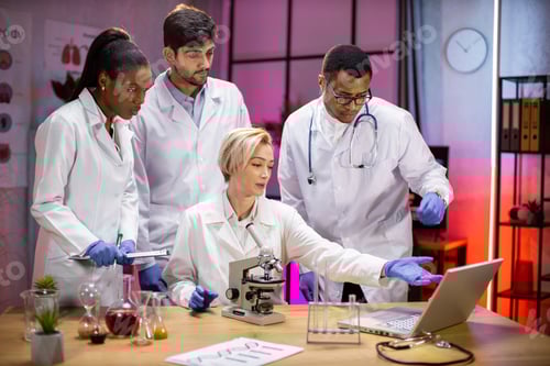 Preview: Team of medical research scientists work on a new generation disease cure.