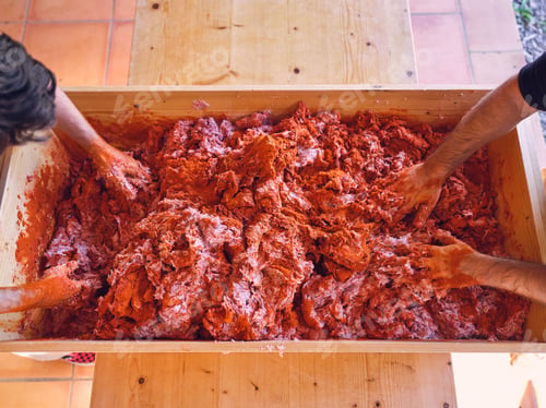 Preview: Crop hands mixing minced meat with spices