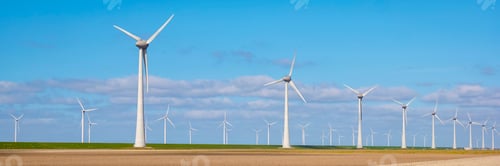 Preview: Windmill park in the ocean, drone aerial view of windmill turbines generating green energy