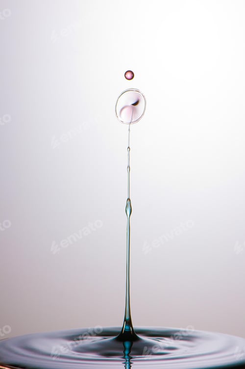 Preview: Splash of colorful liquid with high speed flash