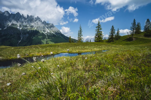 Preview: Mountain pond with Wilder Kaiser range reflecting in water, Tirol - Austria