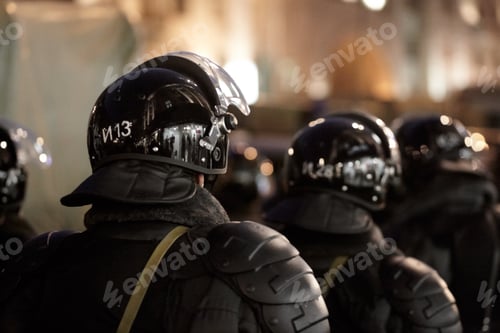 Preview: Hoping for the best, preparing for the worst. The army barricading a riot in the city.