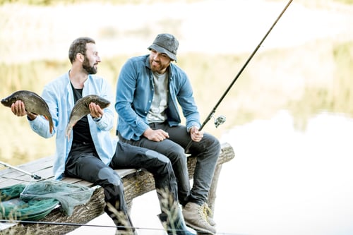Preview: Fishermen with fish on the lake