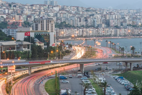 Preview: Konak Square street view with old clock tower (Saat Kulesi) at sunset. Turkey, izmir