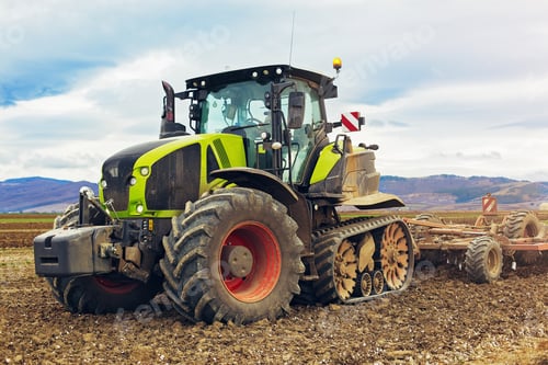 Preview: Modern tractor working on the farm, a modern agricultural transport