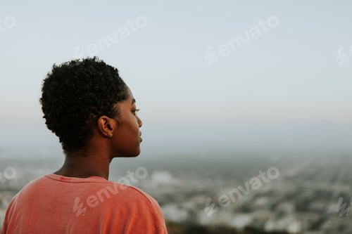 Preview: Woman looking out over the city