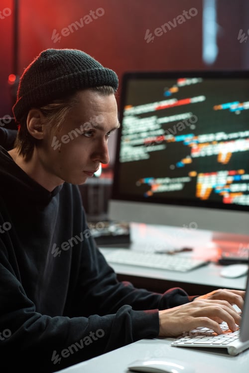 Preview: Serious hacker concentrating at work