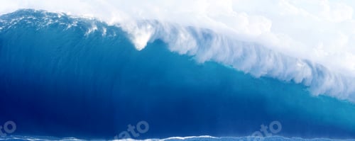 Preview: Large Blue Surfing Wave Breaks in the Ocean