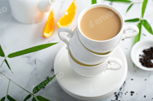 Preview: Earl grey milk tea poured in stacked cups