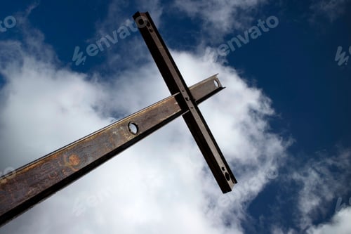 Preview: Iron cross and cloudy sky