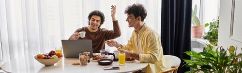 Preview: Modern gay couple enjoying a cozy morning together in their stylish apartment