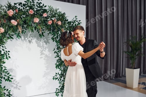 Preview: Dancing together. Beautiful bride with his fiance is on the wedding