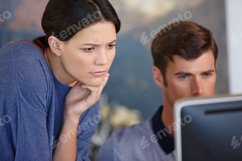 Preview: What does that error message mean. Cropped shot of a couple using a computer at home.