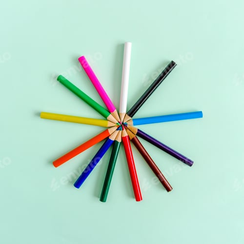 Preview: Colorful colored pencil on green background