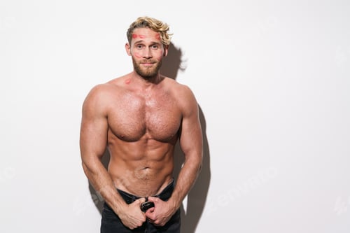 Preview: White shirtless man with lipstick marks smiling and looking at camera