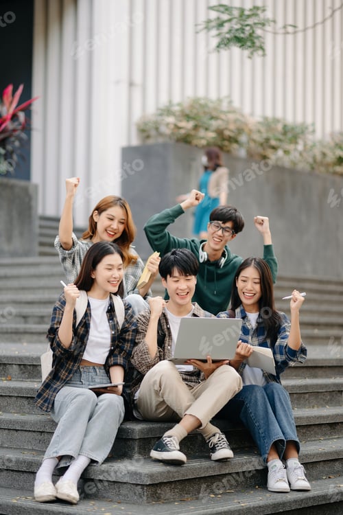 Preview: Young people are spending time together. Reading book, working with laptop and tablet