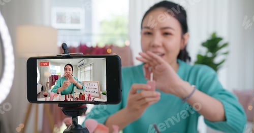 Preview: Asia woman micro influencer record live viral video camera at home studio.