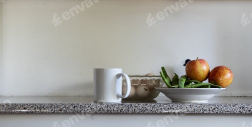 Preview: Closeup shot of apples, eggs and a mug on the table. Morning vibes