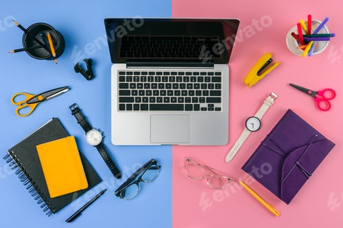 Preview: top view of laptop with blank screen, eyeglasses, wristwatches and notebooks divided at male and
