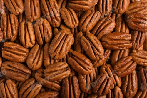 Preview: Tasty fresh ripe pecan nuts as background, top view