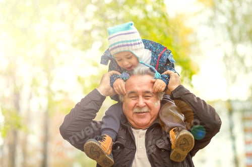 Vista previa: Shot of a happy senior man smiling looking away his grandson hugging him