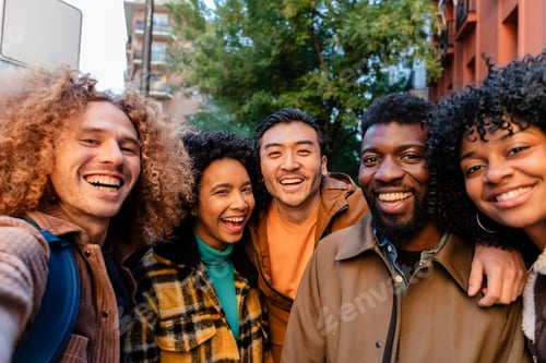 Preview: Happy multi ethnic friends taking selfie in the city