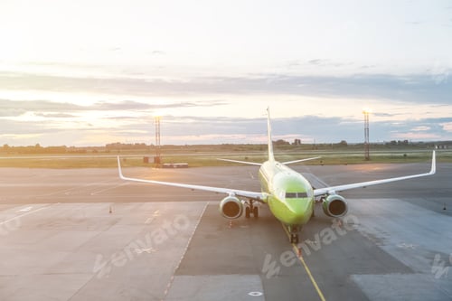Preview: Airport with airplane at beautiful sunset