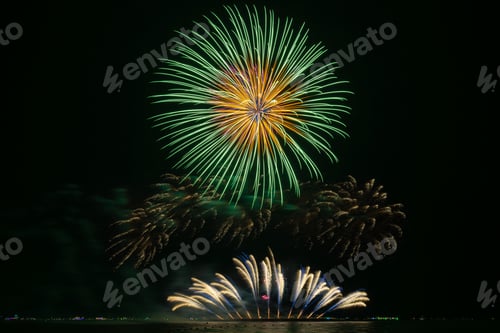 Preview: Multicolored Fireworks Exploding Over Water