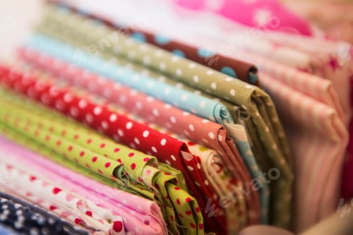Preview: Colorful Fabric Pile with Polka Dot Patterns