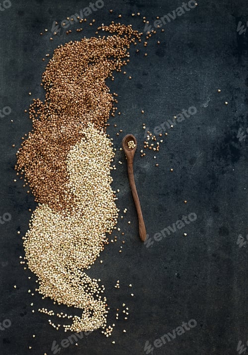 Preview: Green and brown buckwheat groats on dark grunge background